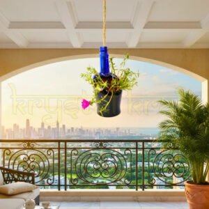 Eco-friendly upcycled blue glass hanging bottle planter for indoor or outdoor décor.