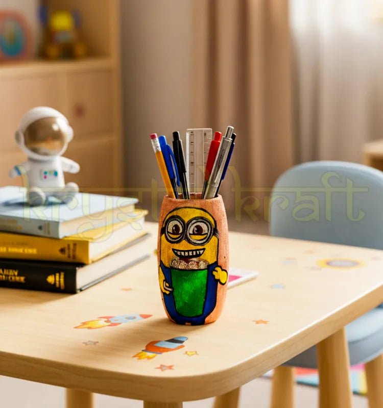 Recycled glass bottle hand-painted with a cute Minion enjoying ice cream on a pink base, crafted by Krystal Kraft as an eco-friendly mini vase or pen stand.