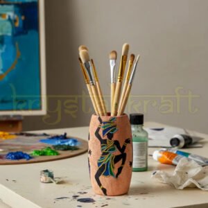 Hand-painted Dancing African Lady artwork on a pink recycled Amul glass bottle by artist Farisa Merchant — a mini eco-friendly vase featuring vibrant acrylic colors and a glossy Liquitex finish.