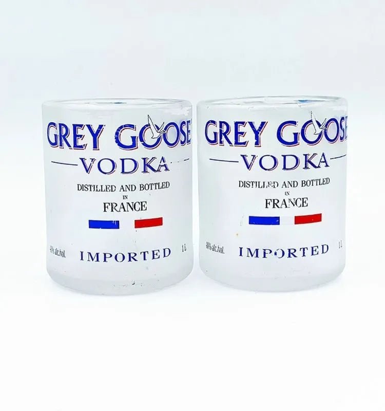 Artisan-made sustainable tumblers with polished rims and iconic branding.