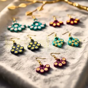 Eco-friendly handmade paper quilling earrings set of 5 by Krystal Kraft, crafted by artist Farisa Merchant"