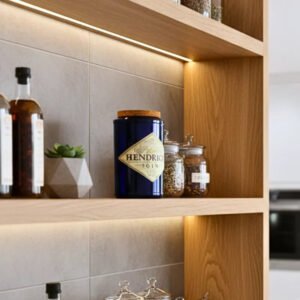 Handcrafted upcycled Hendrick’s-inspired glass jar with a smooth finish and airtight wooden cork lid, perfect for stylish and sustainable kitchen storage.