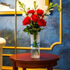 Elegant Grey Goose upcycled glass bottle vase for modern home décor.